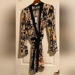 BCBG MAX AZARIA Wrap Dress  size Medium but can fit a large. It's a tie wrap!!